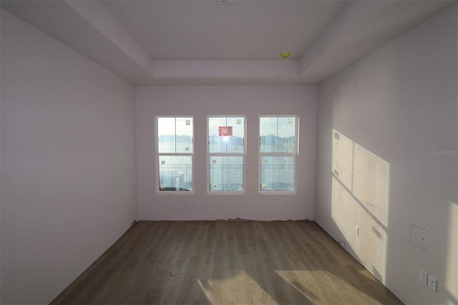 Spacious, unfurnished interior of a new home in Emerald Landing at Waterside at Lakewood Ranch – Lake Series, Sarasota (Image 5).