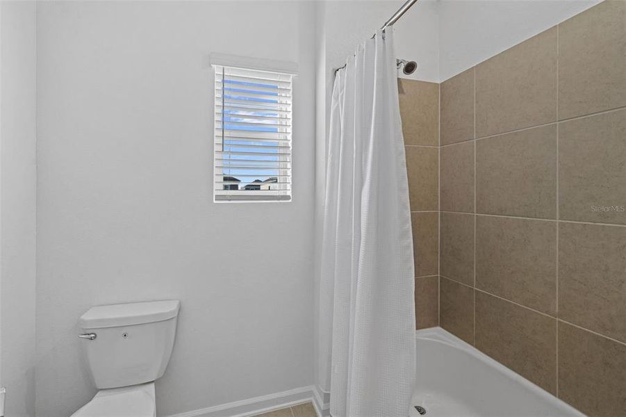 Furnished interior view inside a new home in Wellness Ridge, Clermont (Image 39).