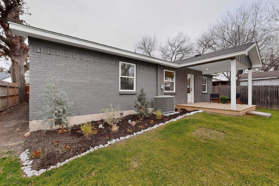 Exterior details and patio area of a home in , White Settlement (Image 28).