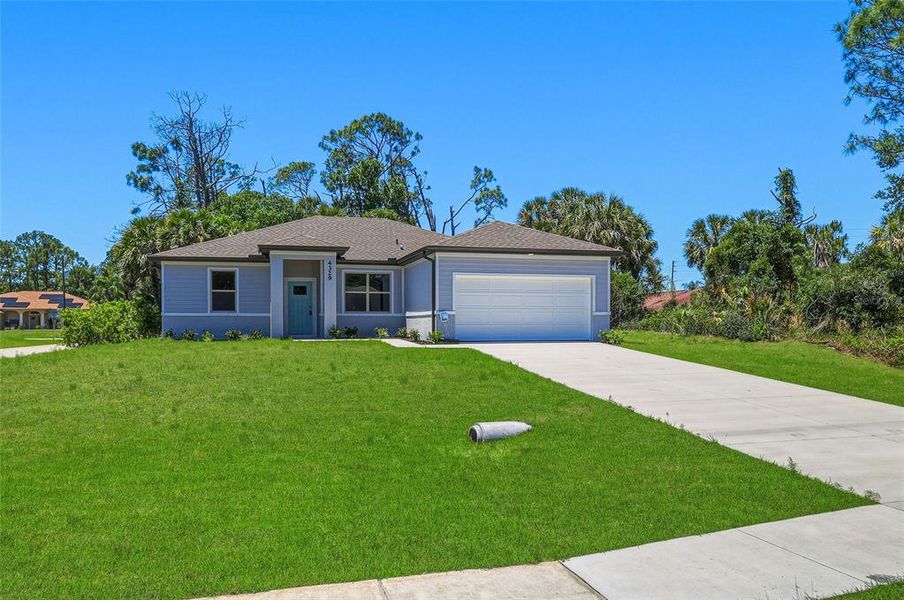 Front exterior of a new home in , North Port, FL, highlighting curb appeal (Image 23).