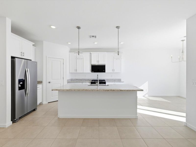 Furnished interior view inside a new home in Paloma Creek - Estate Series, Surprise (Image 4). Furnished interior view inside a new home in Paloma Creek - Estate Series, Surprise (Image 4).