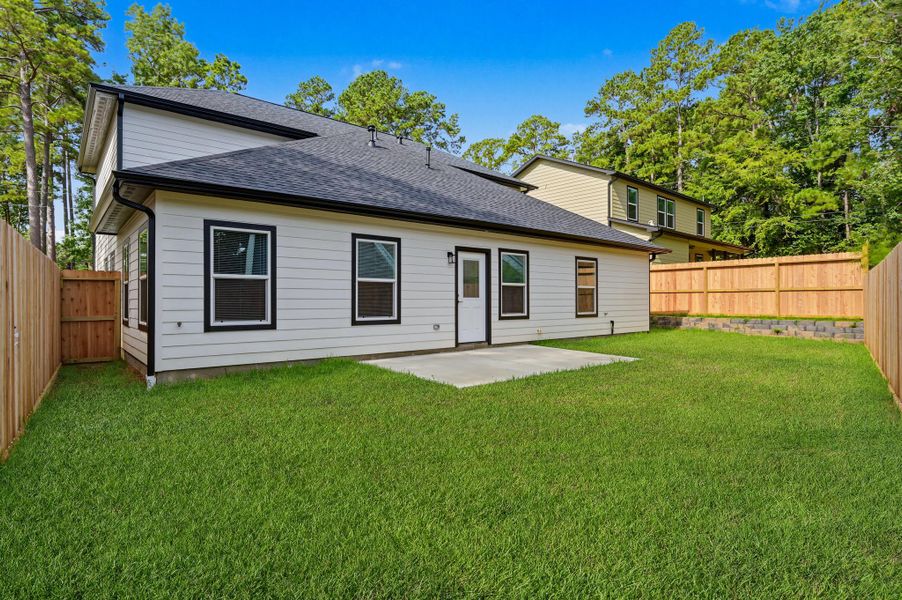 Exterior details and patio area of a home in , Conroe (Image 24). Exterior details and patio area of a home in , Conroe (Image 24).