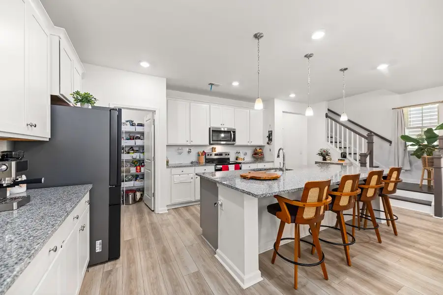 Furnished interior view inside a new home in Boykins Run Townhomes, Moncks Corner (Image 9).