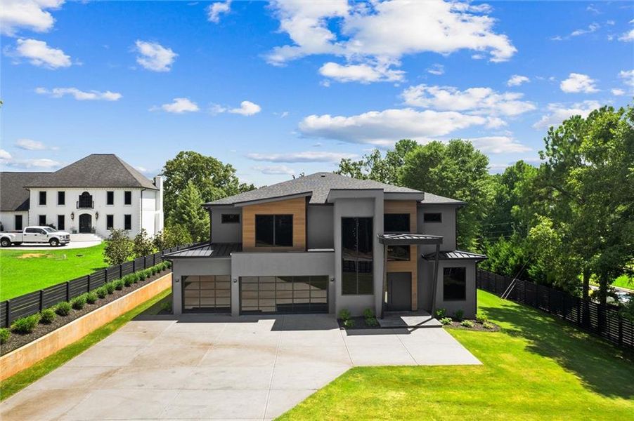 Front exterior of a new home in , Sugar Hill, GA, highlighting curb appeal (Image 31).