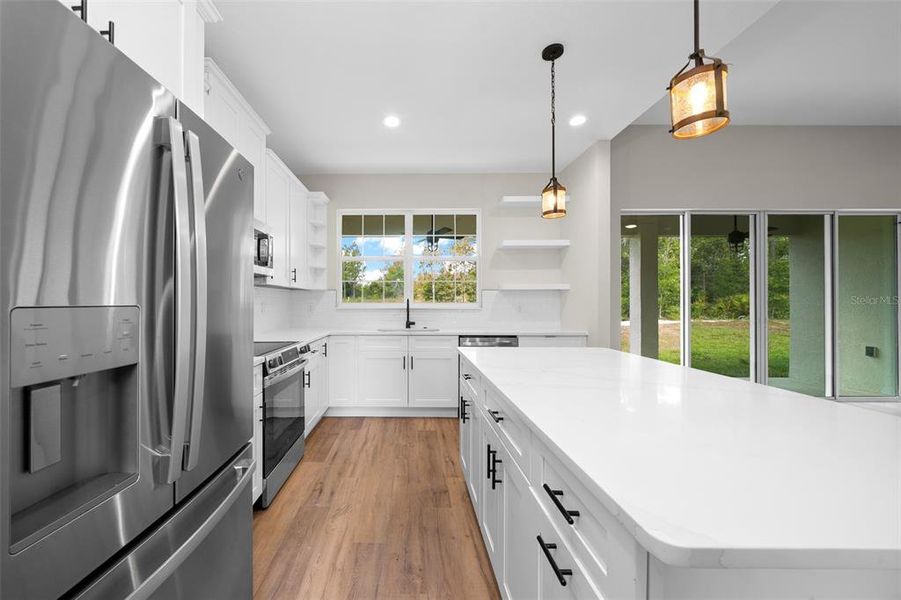 Furnished interior view inside a new home in , Dunnellon (Image 17).