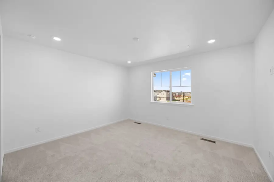 Spacious, unfurnished interior of a new home in Sky Ranch, Watkins (Image 13).