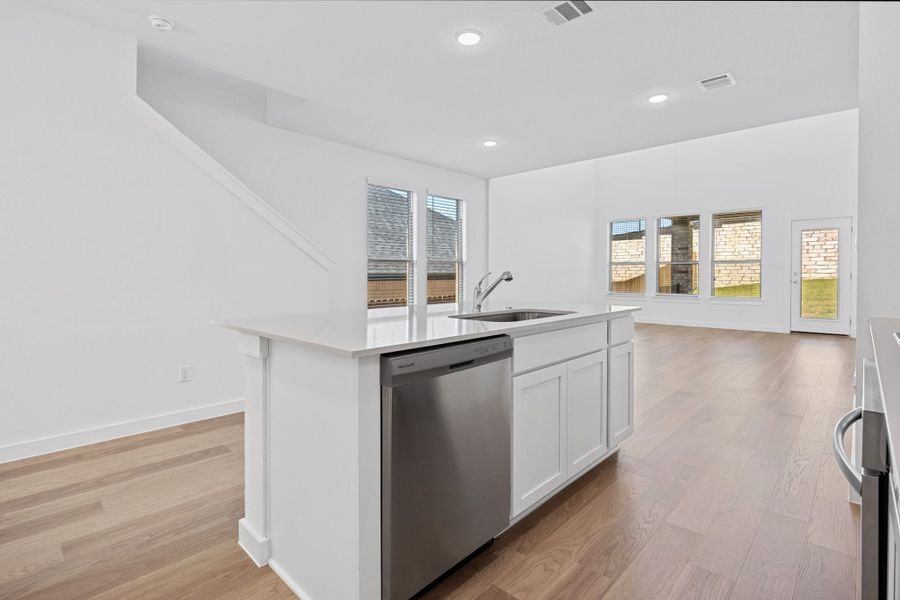 Kitchen in the Mesquite home plan by Trophy Signature Homes – REPRESENTATIVE PHOTO Kitchen in the Mesquite home plan by Trophy Signature Homes – REPRESENTATIVE PHOTO