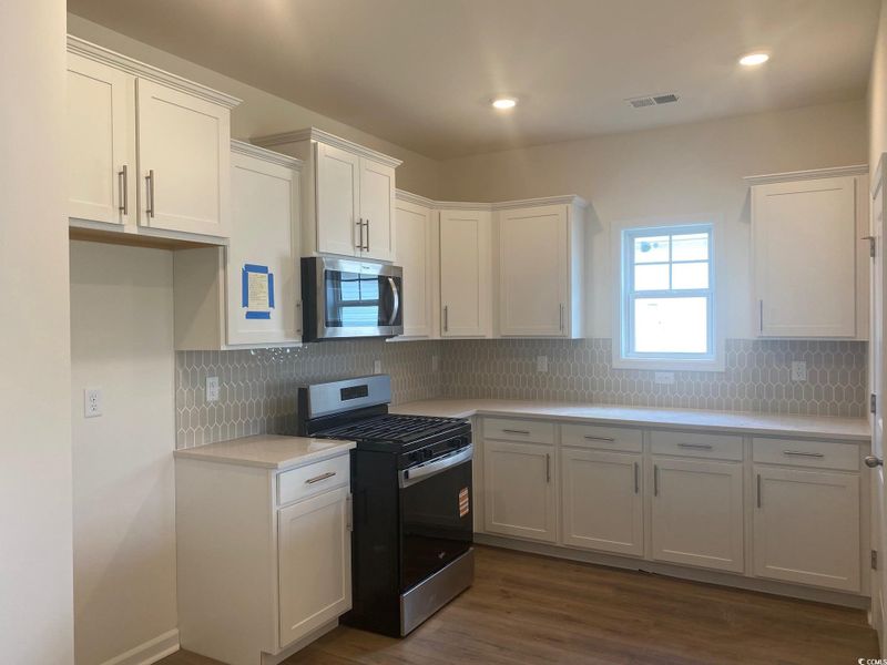 Furnished interior view inside a new home in Oak Hollow, Longs (Image 5).