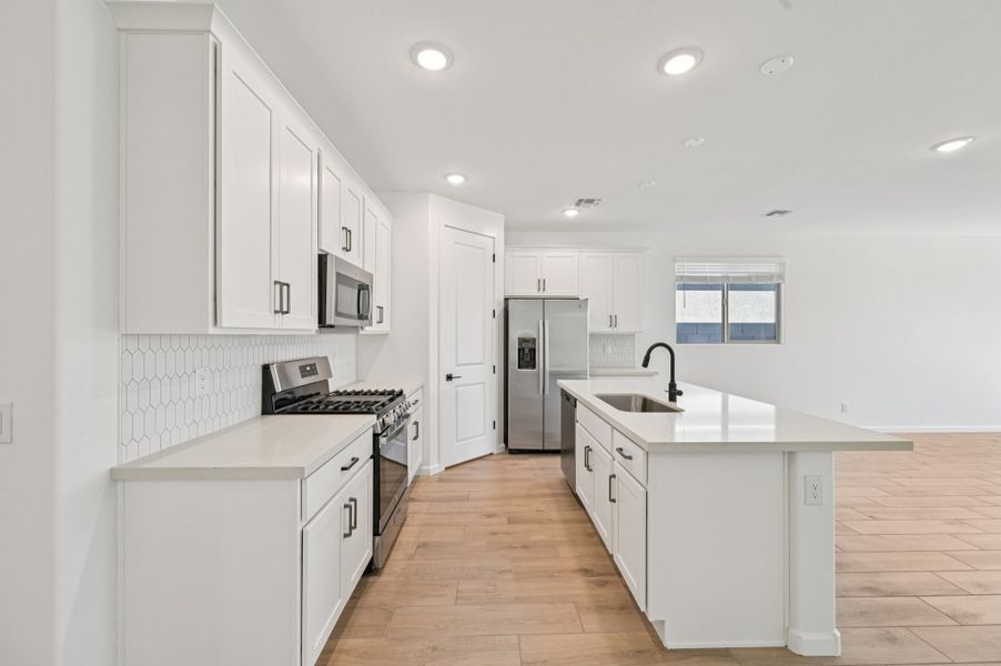 Kitchen featuring the Harmony Collection. Finishes and options may vary by community.