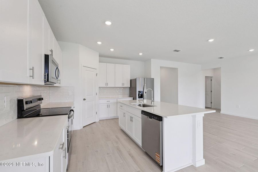 Furnished interior view inside a new home in Colbert Landings, Palm Coast (Image 4).