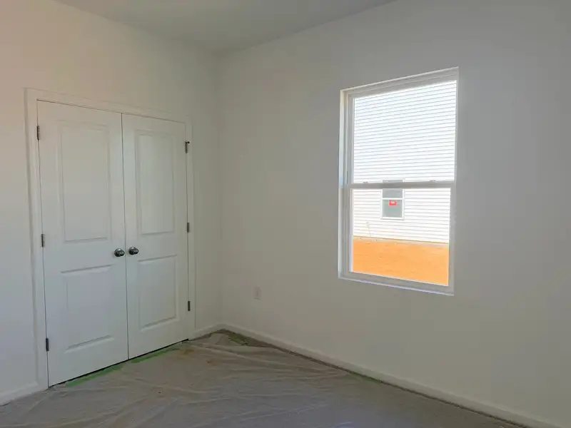 Spacious, unfurnished interior of a new home in Middleton Farms, Middlesex (Image 9).