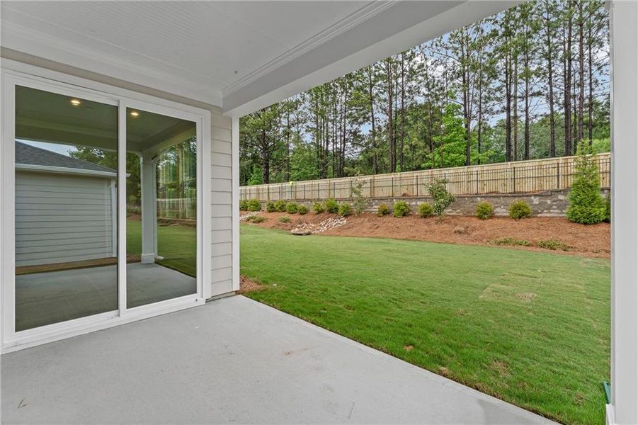 Exterior details and patio area of a home in Sun City Peachtree, Griffin (Image 3).