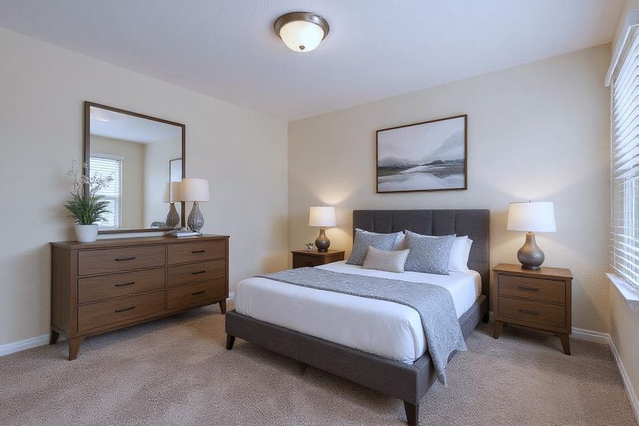 Virtually Staged: Bedroom featuring light carpet and baseboards Virtually Staged: Bedroom featuring light carpet and baseboards