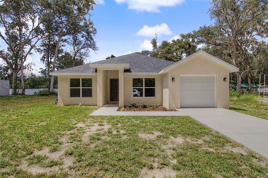 Front exterior of a new home in , Ocala, FL, highlighting curb appeal (Image 18). Front exterior of a new home in , Ocala, FL, highlighting curb appeal (Image 18).