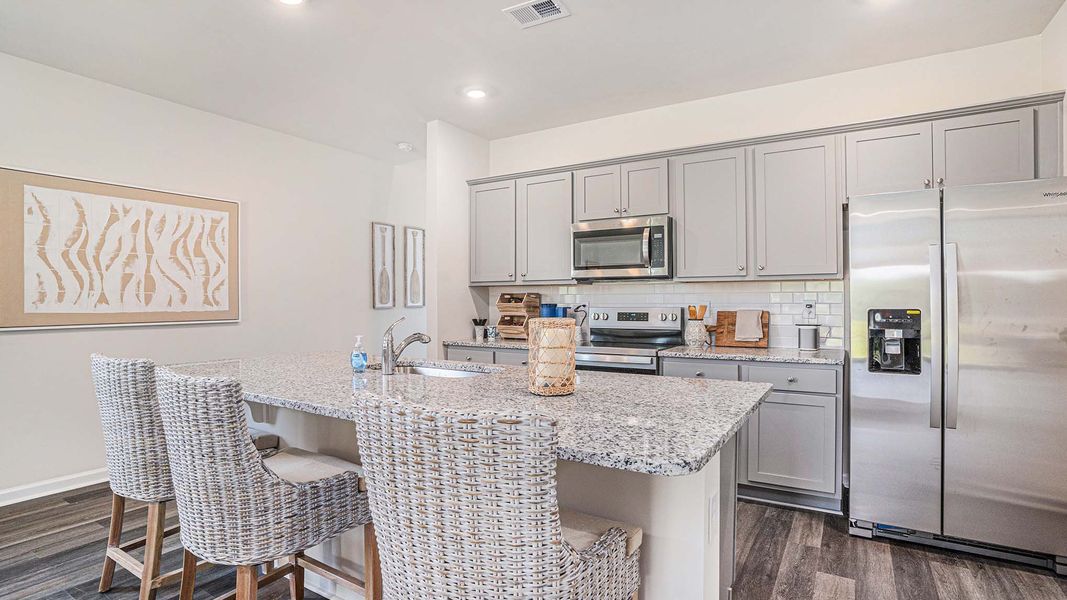 Representative furnished interior of a home built from the MANNING by D.R. Horton in Jordanville Farms, Galivants Ferry (Image 3).