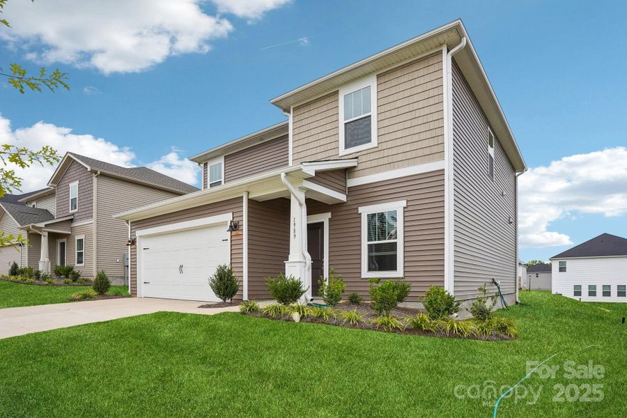 Front exterior of a new home in Harper Landing, Stanley, NC, highlighting curb appeal (Image 18).