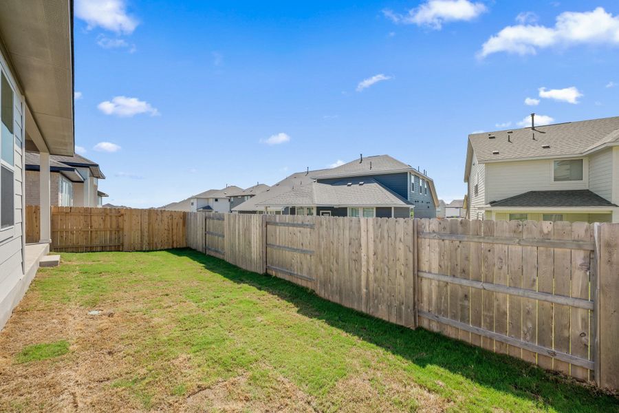 Exterior details and patio area of a home in Lariat, Liberty Hill (Image 26). Exterior details and patio area of a home in Lariat, Liberty Hill (Image 26).