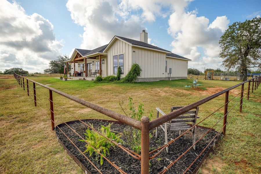 Front exterior of a new home in , Waelder, TX, highlighting curb appeal (Image 19).