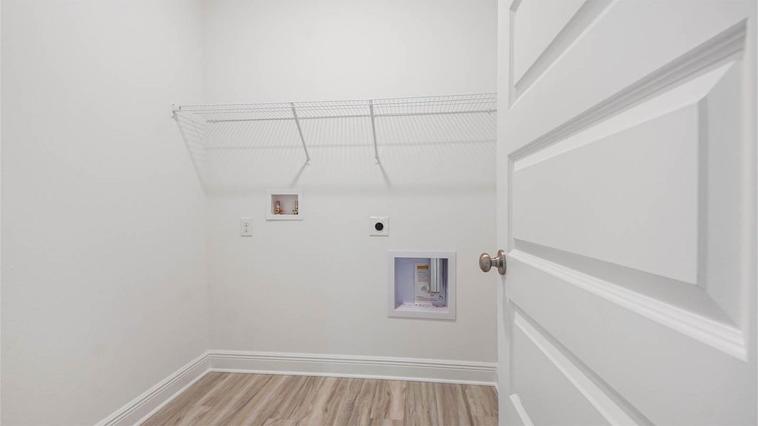Representative unfurnished interior of a home built from the Kennedy by D.R. Horton in Bayside at Ward Creek, Panama City Beach (Image 29).