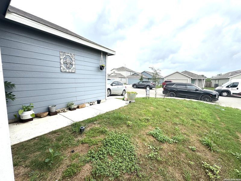Exterior details and patio area of a home in Stone Garden, Elmendorf (Image 4).