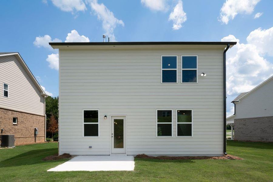 Front exterior of a new home in Windance Lake, Loganville, GA, highlighting curb appeal (Image 17). Front exterior of a new home in Windance Lake, Loganville, GA, highlighting curb appeal (Image 17).
