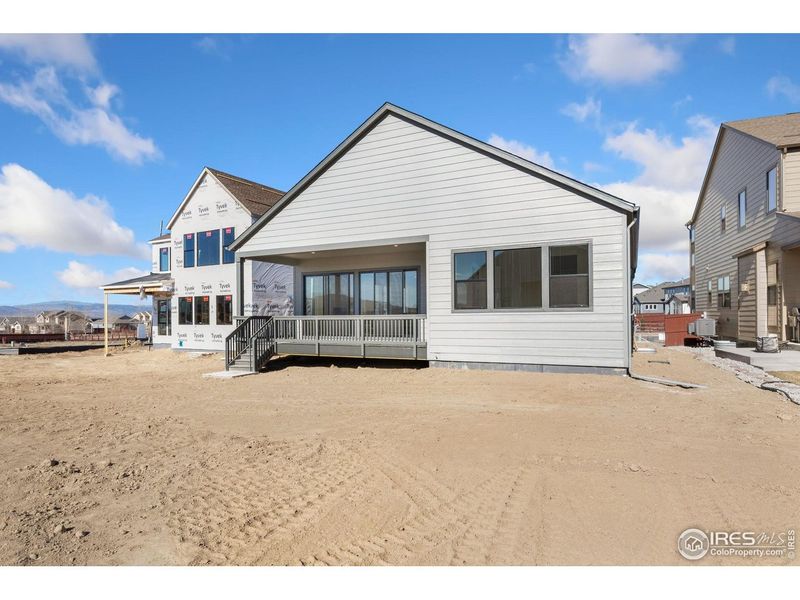 Exterior details and patio area of a home in Festival at RainDance, Windsor (Image 3).