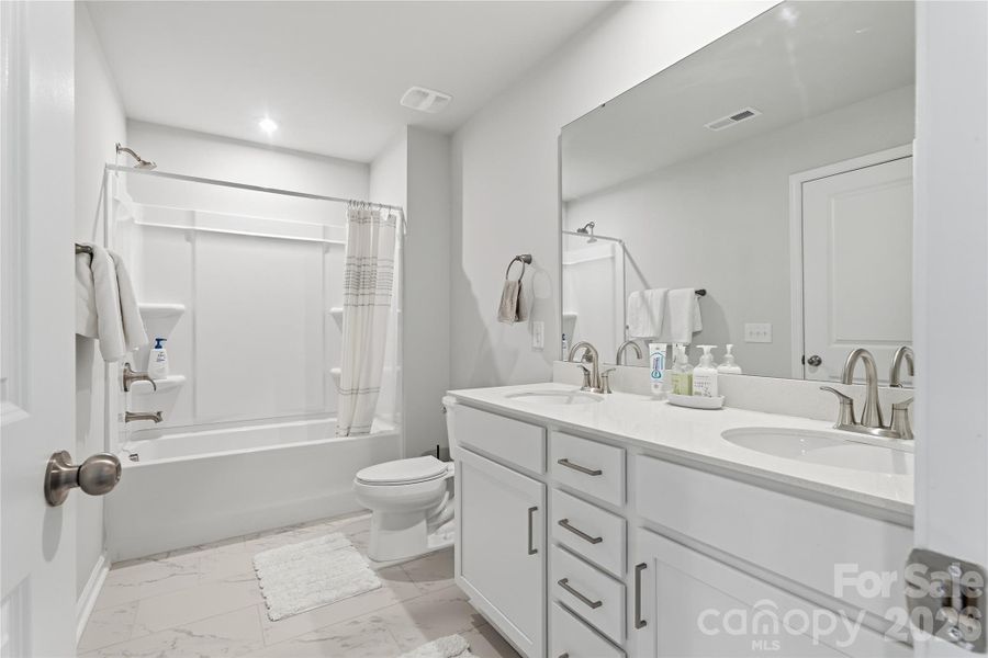 Furnished interior view inside a new home in Clairmont, Charlotte (Image 31).