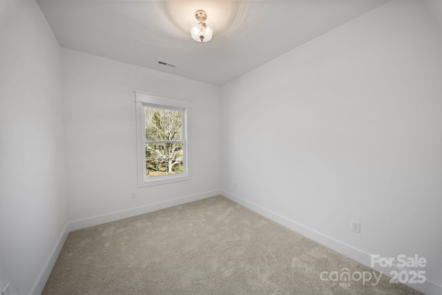 Spacious, unfurnished interior of a new home in , Asheville (Image 25).