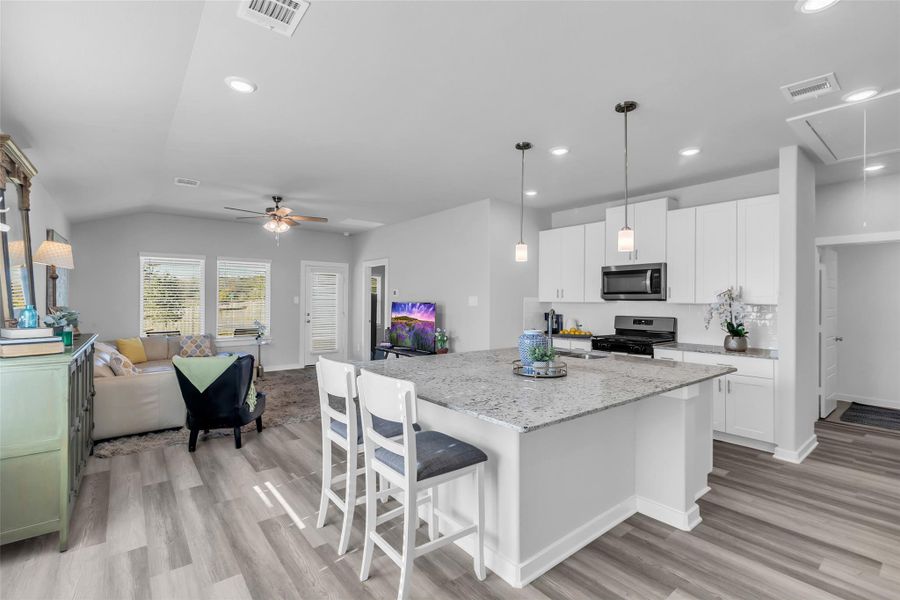 Such open living. View from front door towards kitchen and great room.