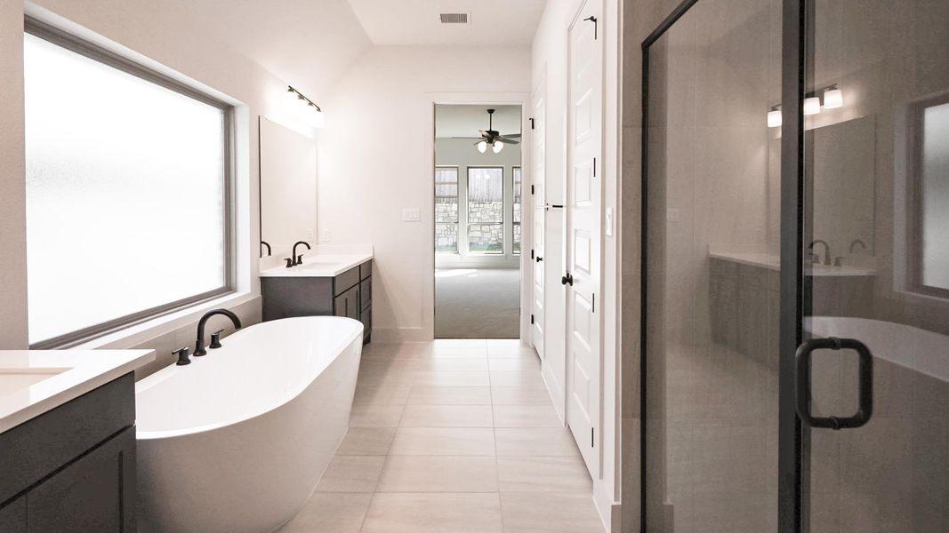 Furnished interior view inside a new home in Crosswinds, Kyle (Image 11).
