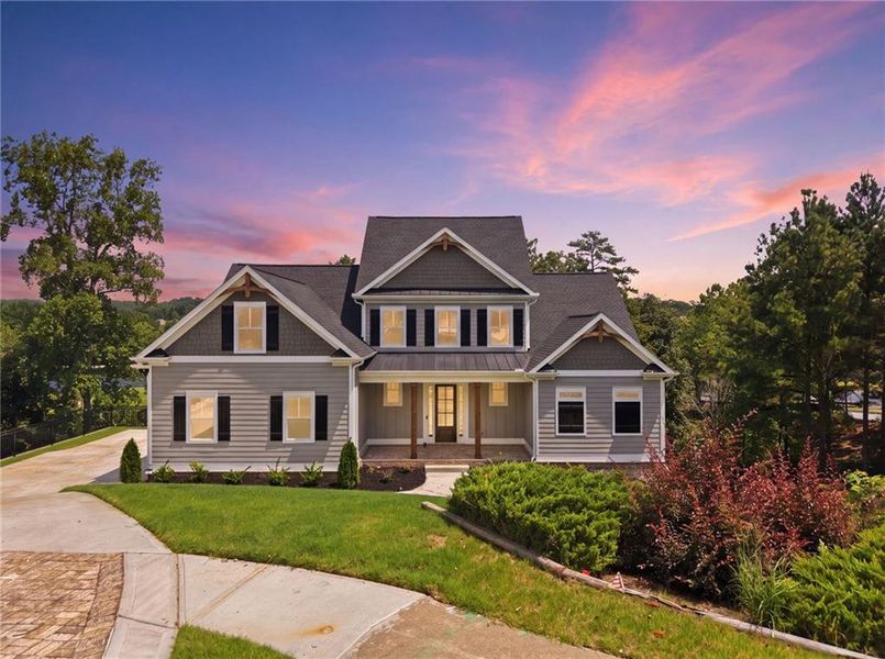 Front exterior of a new home in , Flowery Branch, GA, highlighting curb appeal (Image 1). Front exterior of a new home in , Flowery Branch, GA, highlighting curb appeal (Image 1).