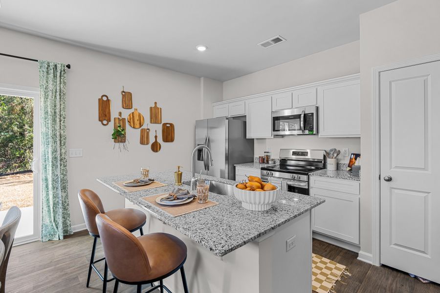 Representative furnished interior of a home built from the Oak by McGuinn Homes in Faith Hill, West Columbia (Image 10).