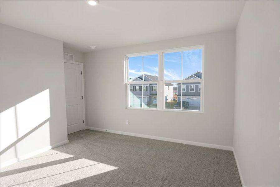 Spacious, unfurnished interior of a new home in Wren Woods 2-Story, Gray Court (Image 26).