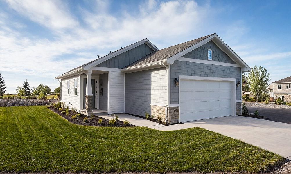 Front exterior of a new home in Trails at Aspen Ridge-3, Colorado Springs, CO, highlighting curb appeal (Image 6).