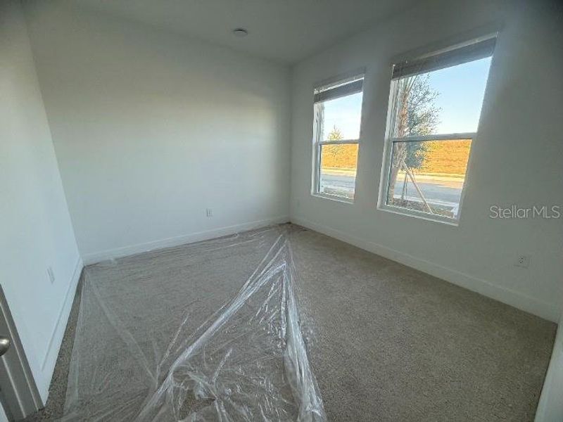 In-progress construction of a new home in Parkview at Hamlin, Winter Garden, FL (Image 26).