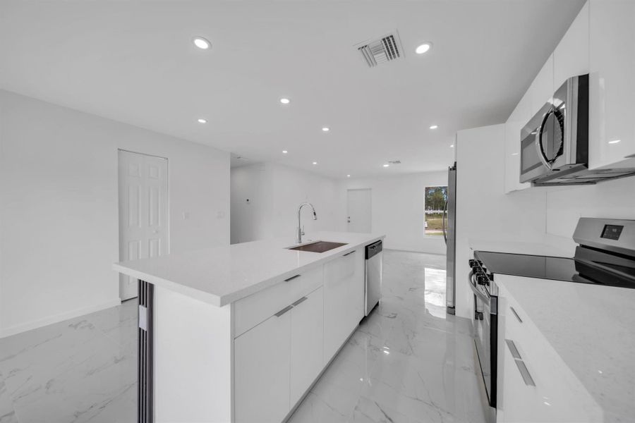 Furnished interior view inside a new home in , Lehigh Acres (Image 7).