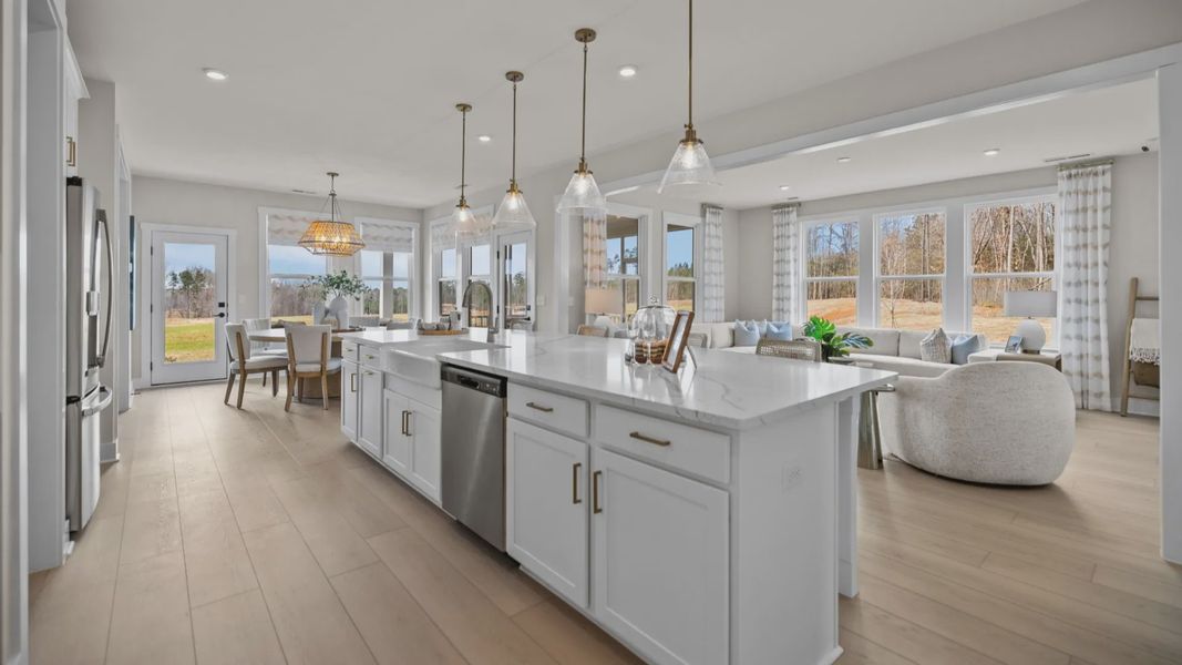 The Stonefield Home Plan in Michaux Garden by DRB Homes in Belmont, NC. -Kitchen