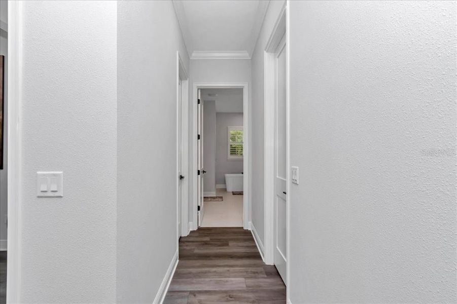 hall with dual closets in primary