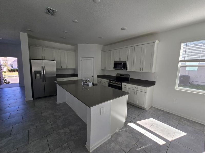 Furnished interior view inside a new home in Rhett's Ridge, Apopka (Image 8).