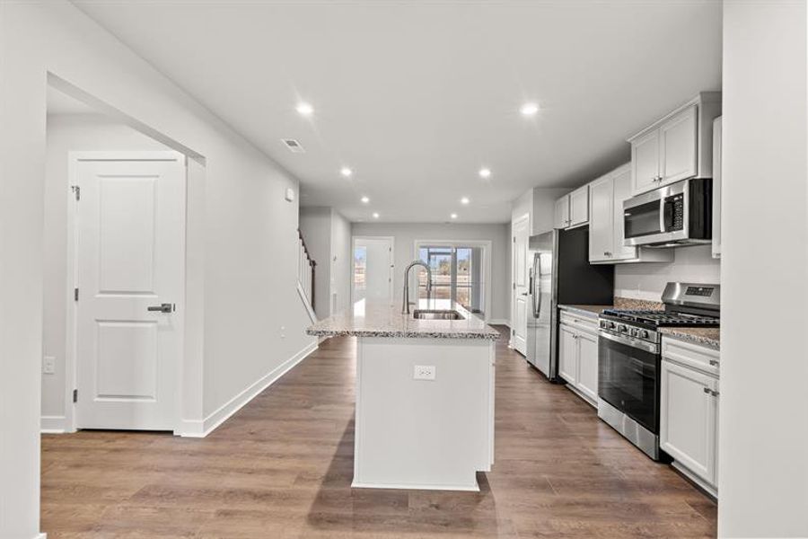 Furnished interior view inside a new home in Lakes at Riverbend Townhomes, Navassa (Image 4).