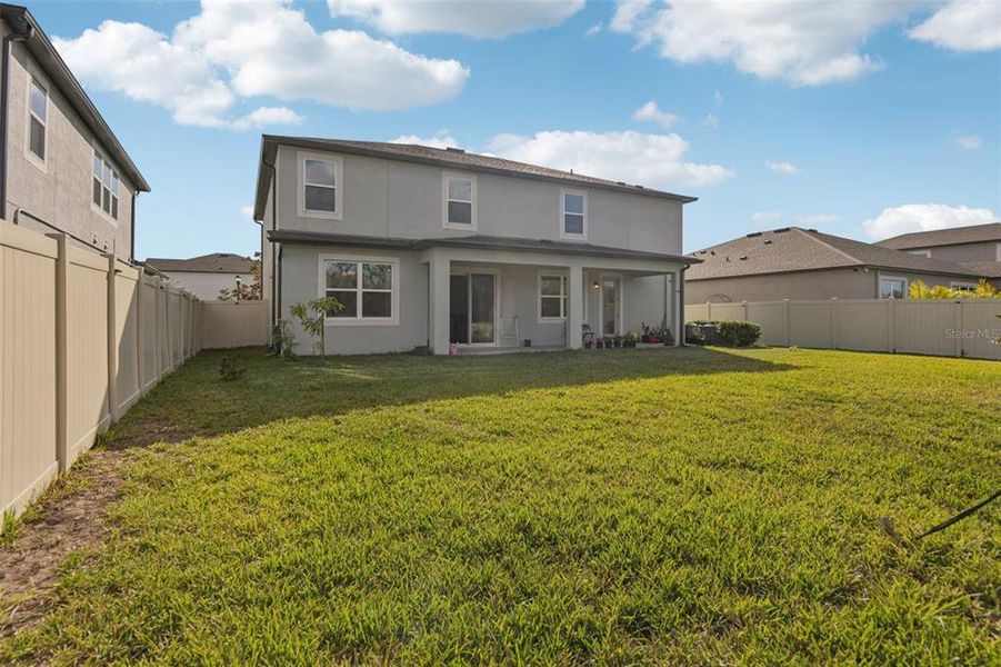 Exterior details and patio area of a home in , Spring Hill (Image 3).