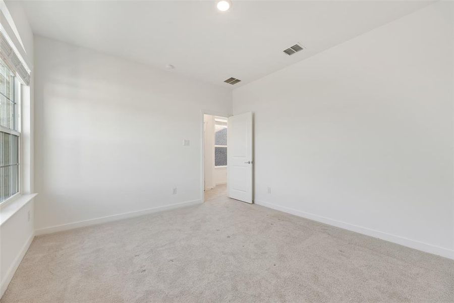 Spacious, unfurnished interior of a new home in Solterra, Mesquite (Image 21).
