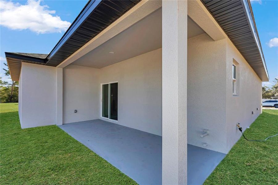 Exterior details and patio area of a home in , Ocala (Image 24).