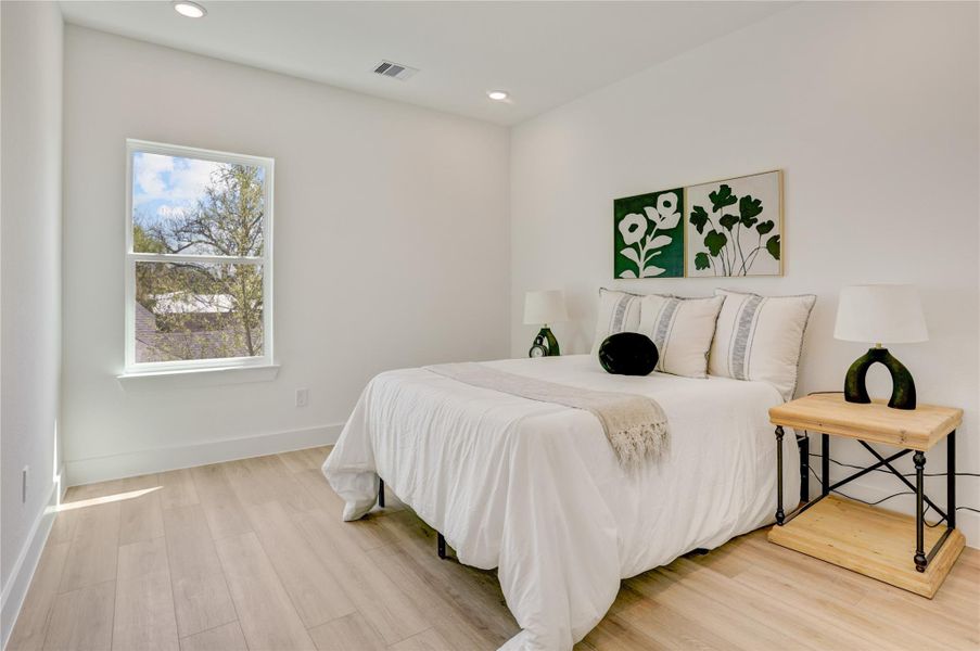 The 11x11 SF 2nd bedroom has a large wall closet.