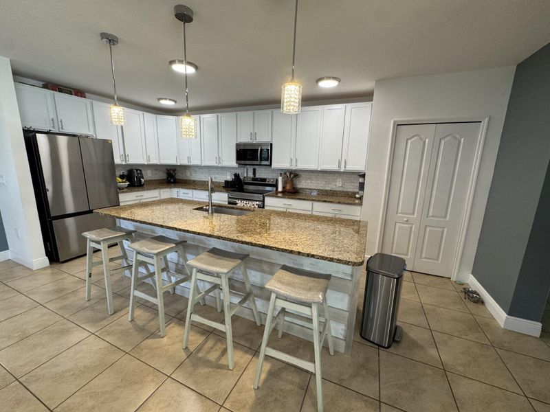 Furnished interior view inside a new home in , Port St. Lucie (Image 16).