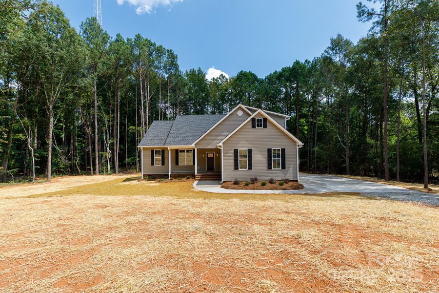 Front exterior of a new home in , Chester, SC, highlighting curb appeal (Image 15).
