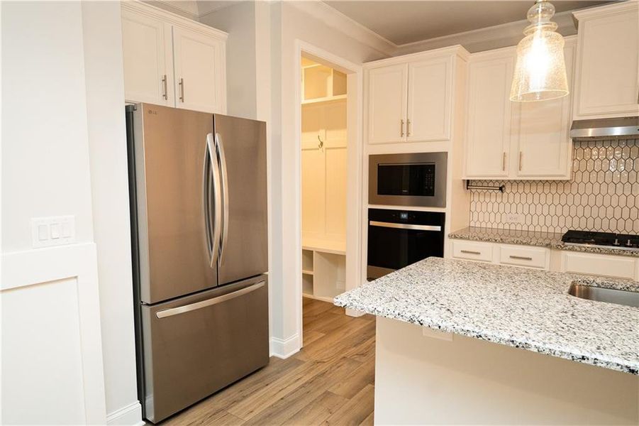 Furnished interior view inside a new home in Canterbury Reserve, Lawrenceville (Image 9).