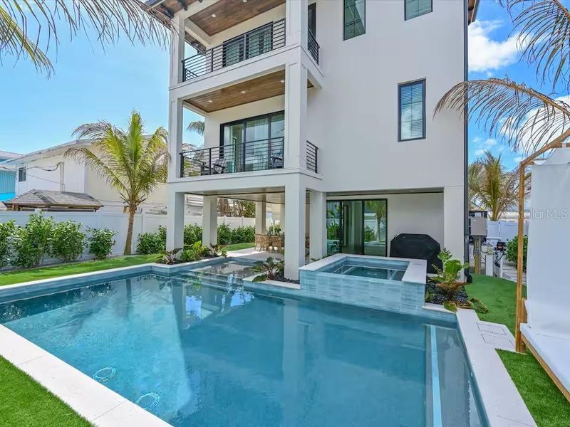 Exterior details and patio area of a home in , Bradenton Beach (Image 26).