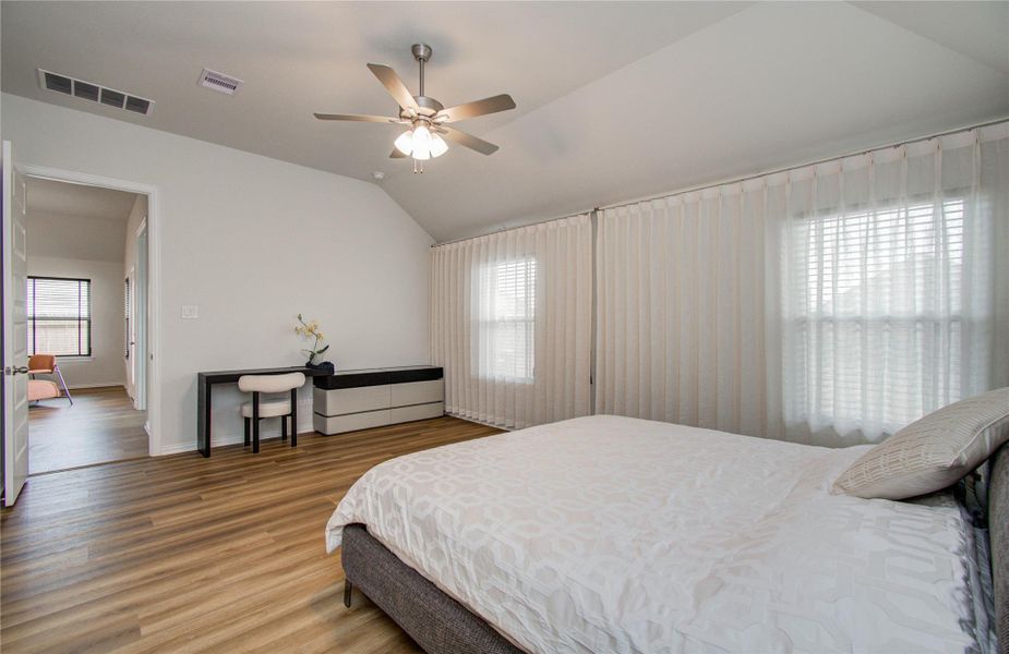 Furnished interior view inside a new home in Sunterra, Katy (Image 9).