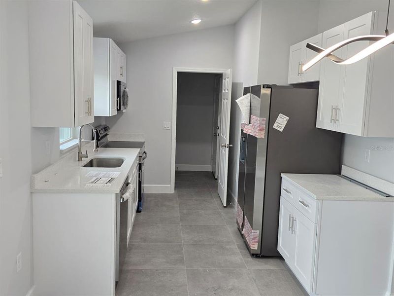 Furnished interior view inside a new home in , Dunnellon (Image 6).